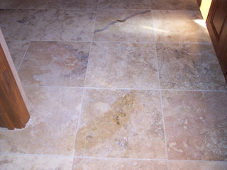 Home stone floor is grimy and needs cleaning