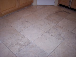 A Gilbert Arizona home with travertine floors about to be cleaned